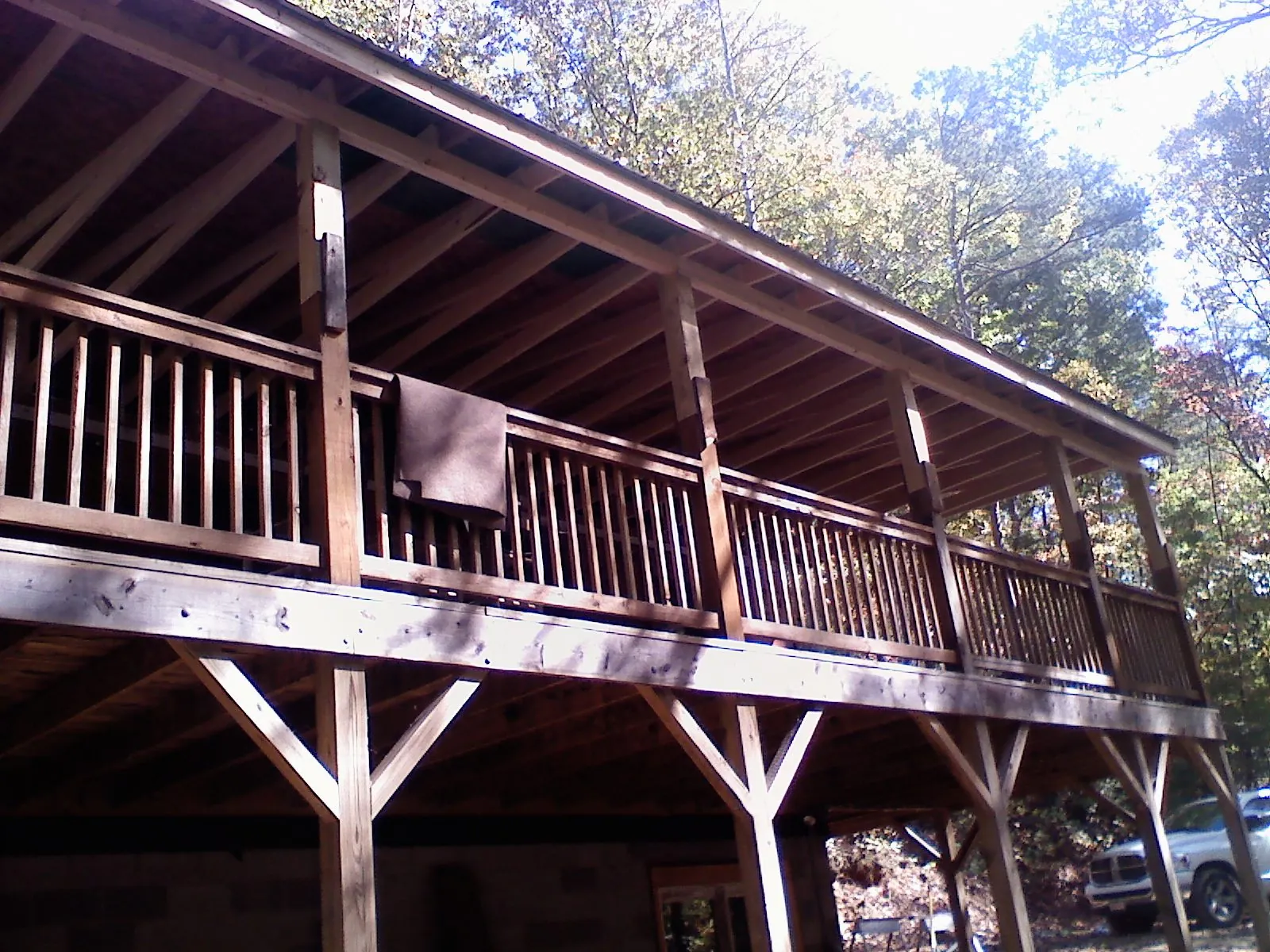 Timber framing under a new elevated porch and deck — Roof Leak Repair in Standish by Roofing Brothers